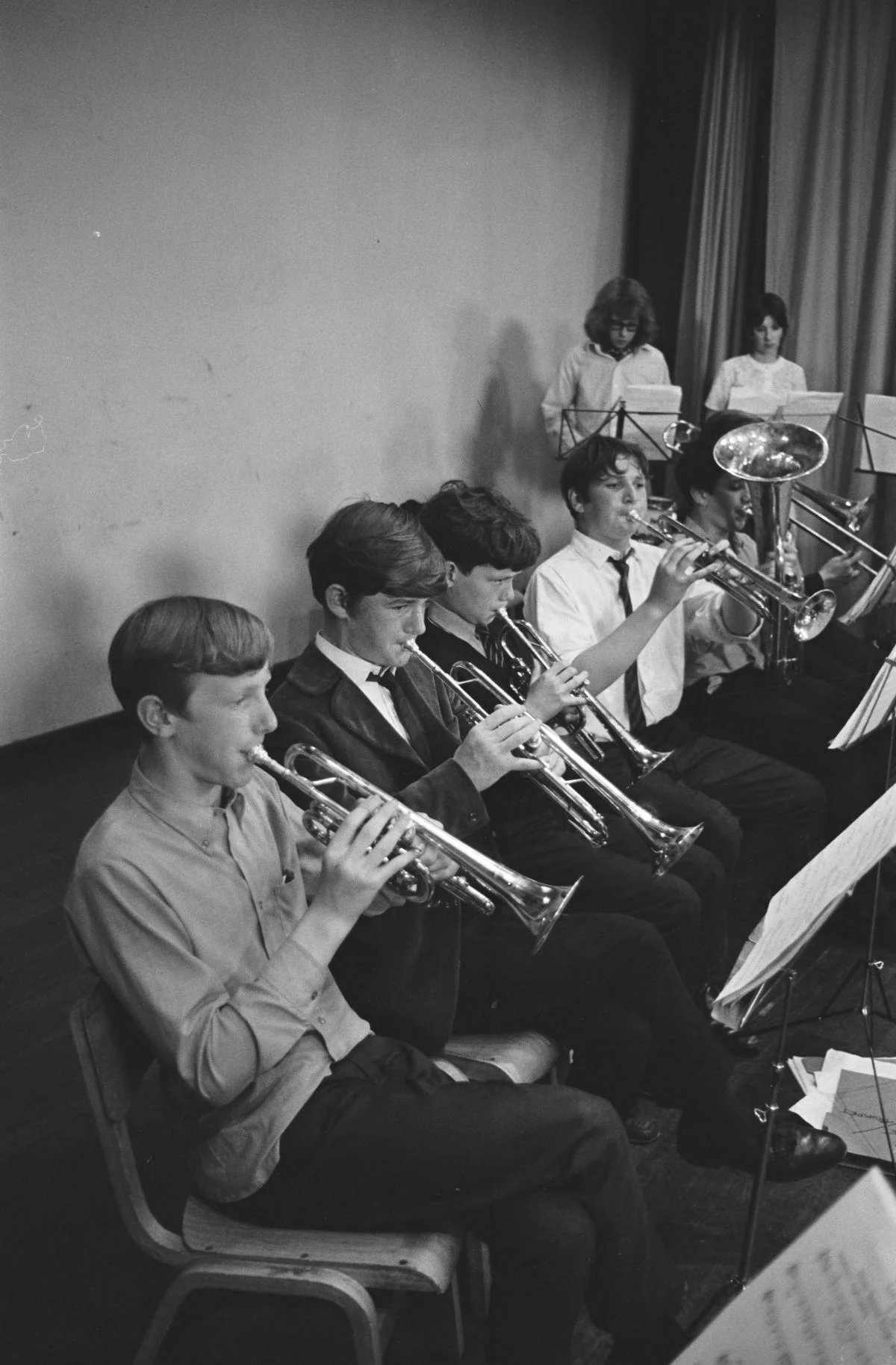 Trumpet players rehearsing in an orchestra Trumpet players rehearsing in an orchestra