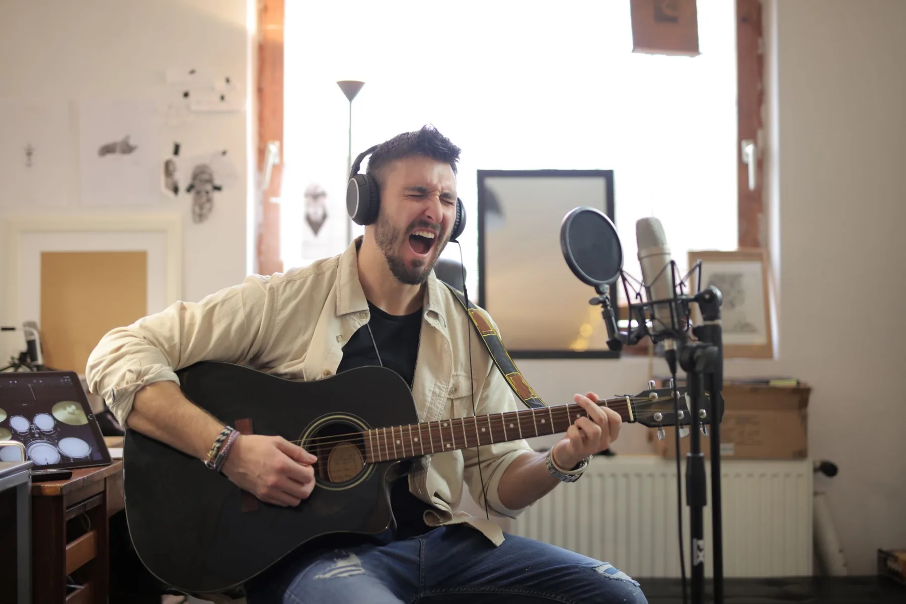 Guitarist and singer in his studio