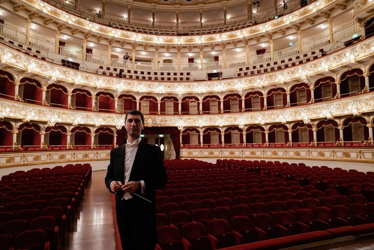 Conductor in a concert hall