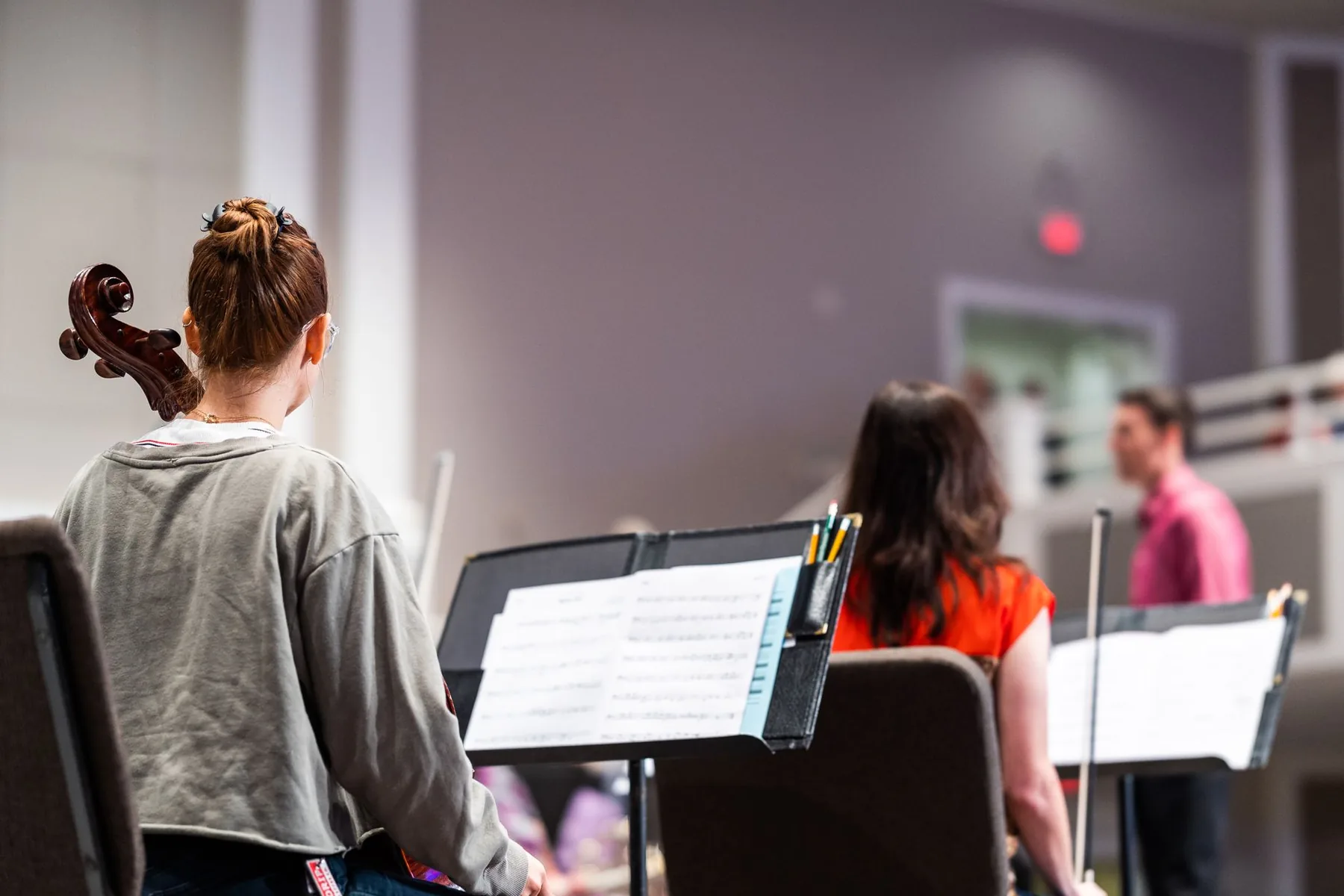 Musicians rehearsing with their sheet music