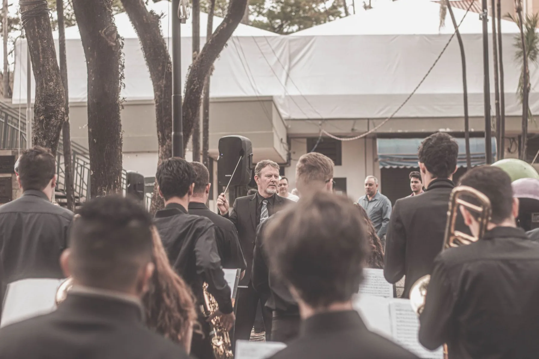 Conducting an orchestra outdoors Conducting an orchestra outdoors