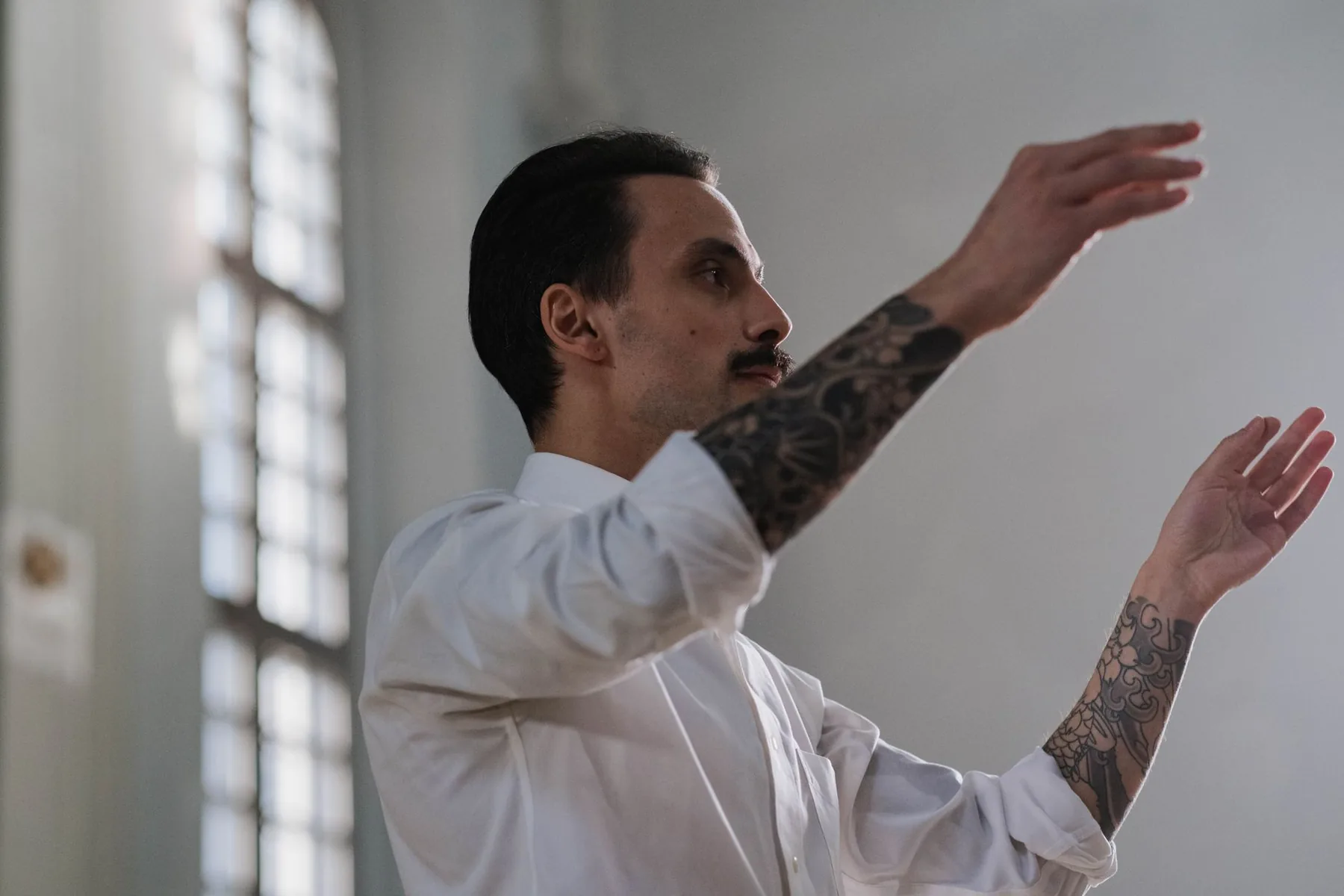 Conductor leading with their hands Conductor leading with their hands