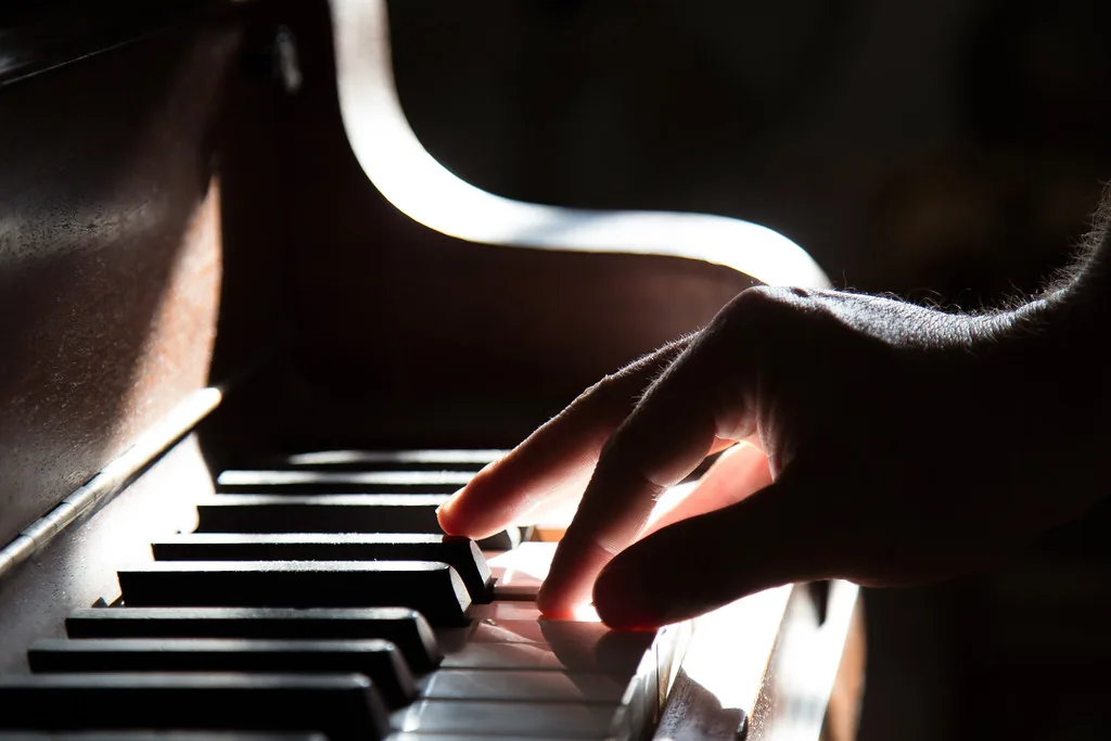 Hands playing a work by Debussy