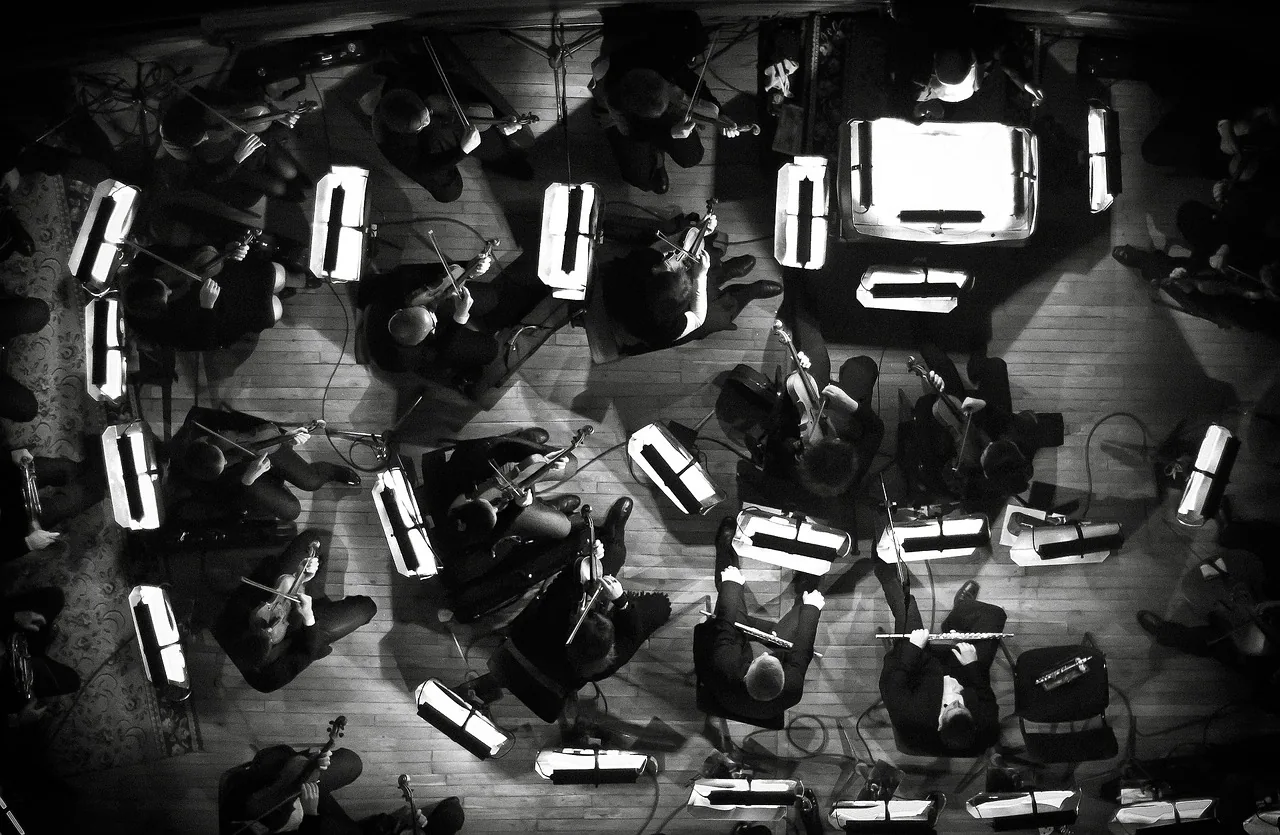 Orchestra performing a work by Debussy Orchestra performing a work by Debussy