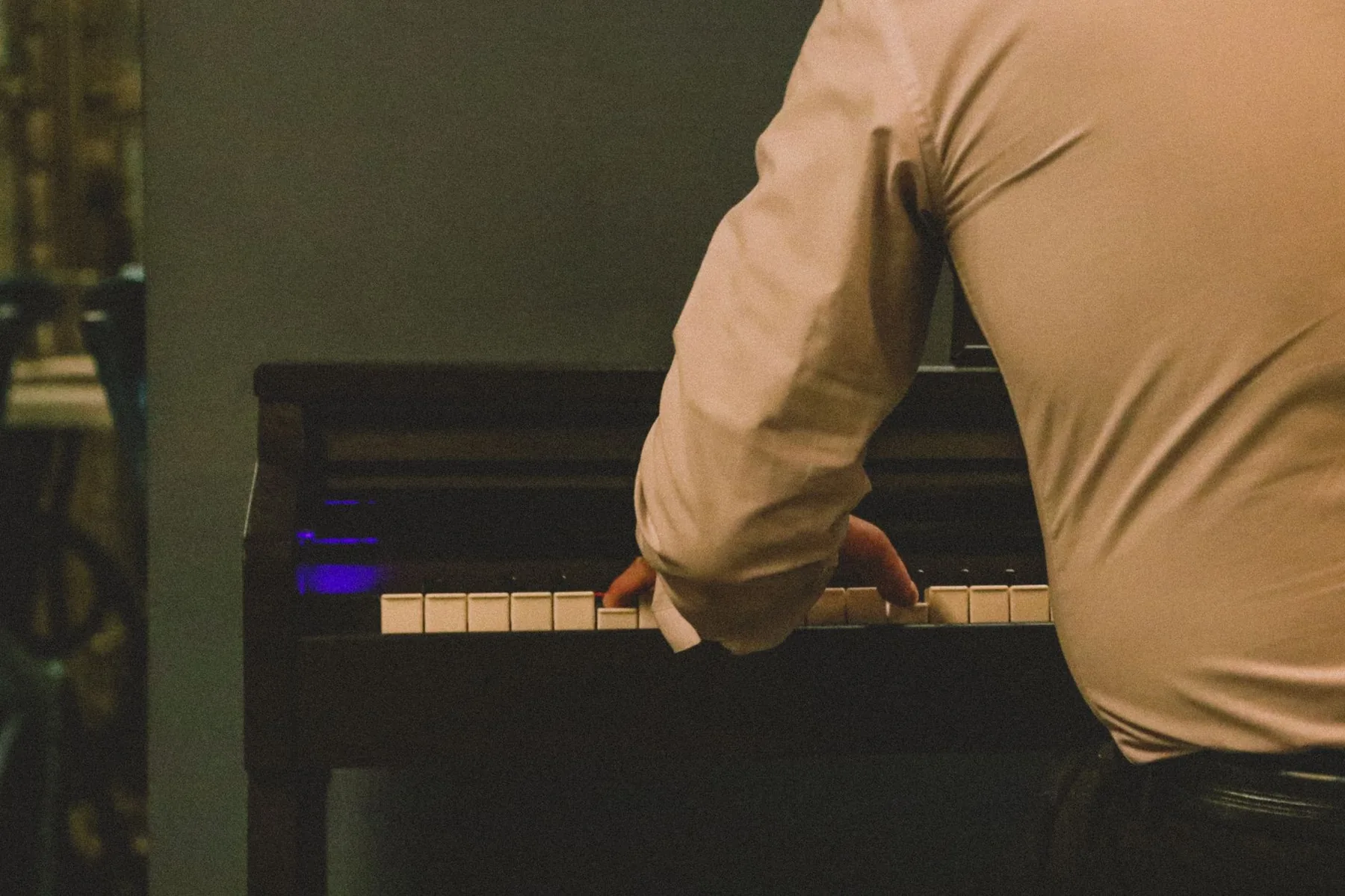 Composer playing a classical piano