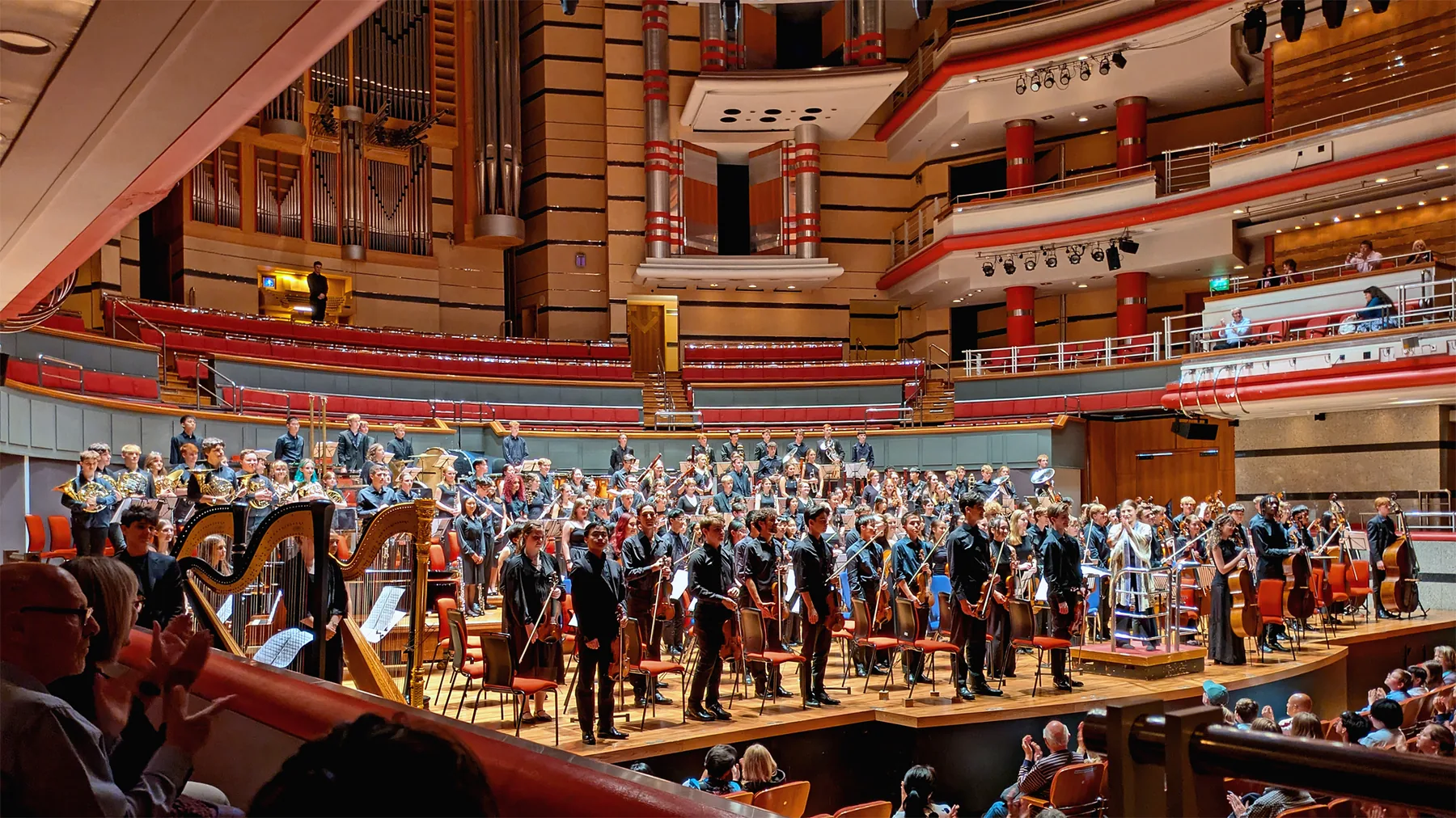 Large symphony orchestra in a concert hall Large symphony orchestra in a concert hall